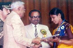 Selvi R, receiving Best Employee National Award from President of India