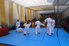 School students displaying Judo skills