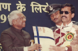 Brij Mohan Acharya, receiving  Best Employee National Award  from President of India